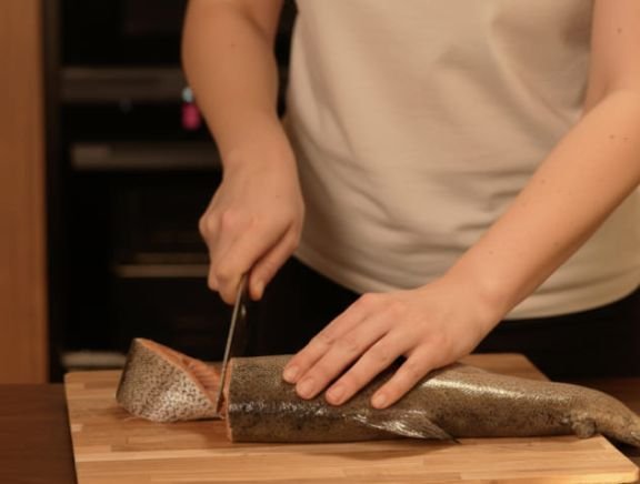 Customer photo of salmon being sliced with a Matsato knife